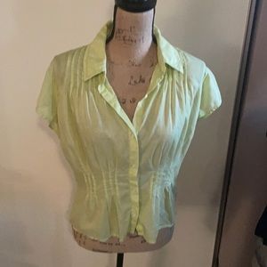 Lime green cotton cap sleeve shirt.